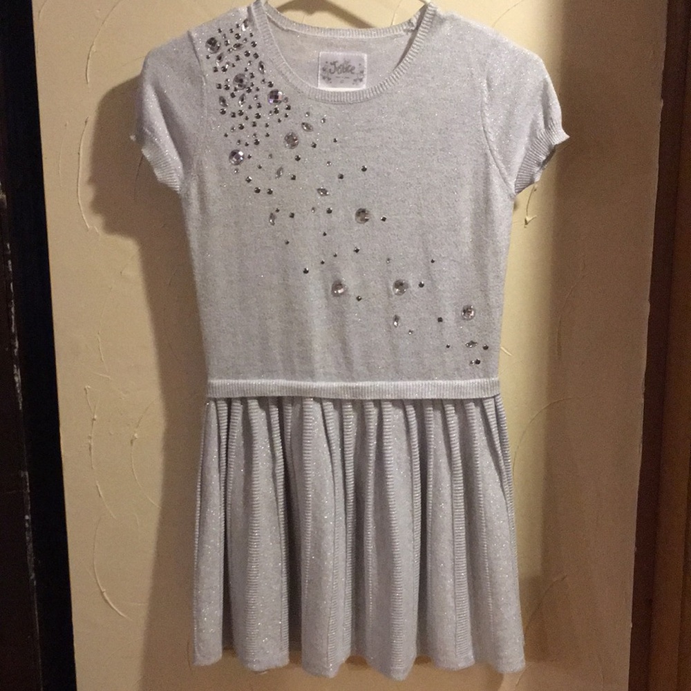 Very sparkly dress! Justice!